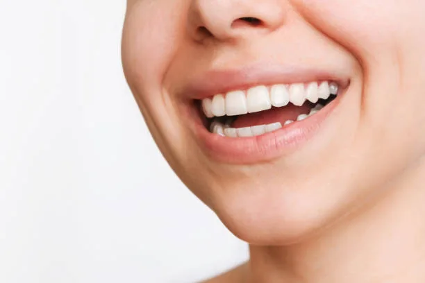 close-up shot of a woman's beautiful smile